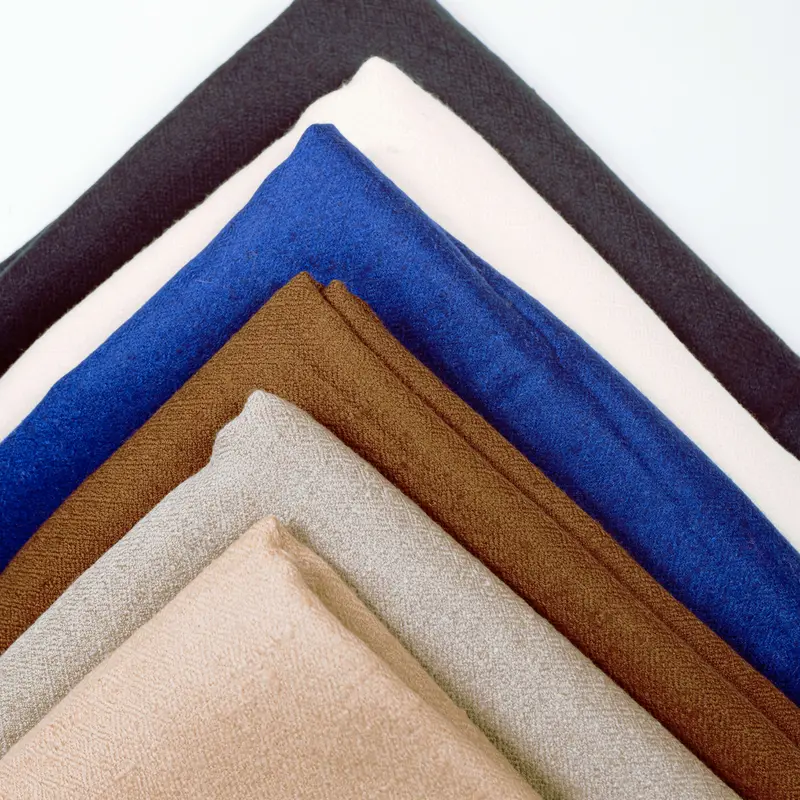 Basoli shawls in a layered colour palette